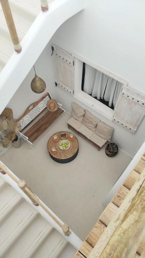 Cama en habitación compartida con 4 camas
