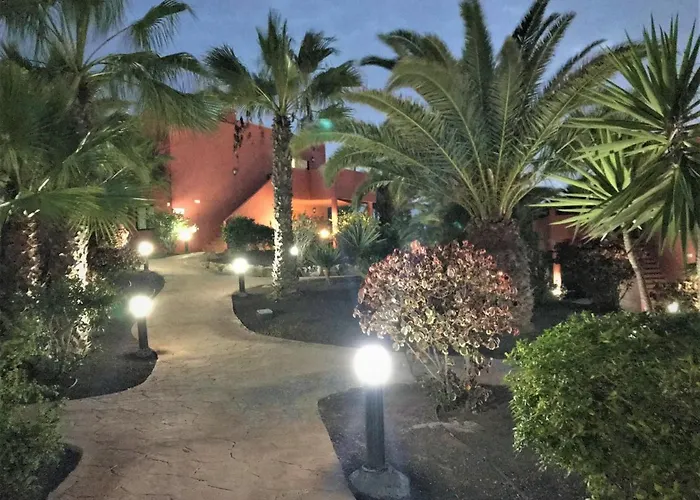 Tropical Garden Retreat: Private Terrace & Pool Oasis Apartment Corralejo